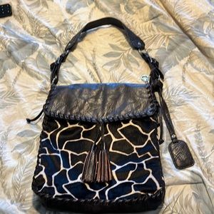 Leather Treska boho purse with cowhide front excellent condition! Snap and